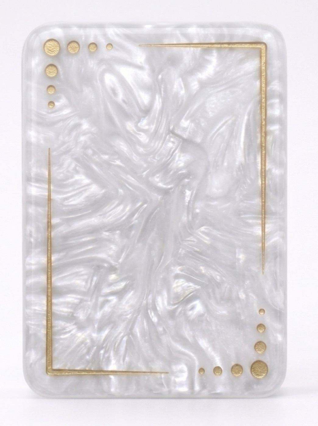 Blank pearlescent mahjong tile blank with a gold corner border and no artwork