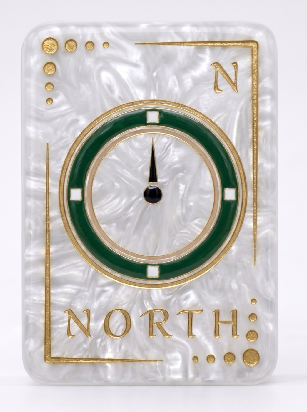 AI-generated finished mahjong tile marked North, with a green compass ring on the same pearlescent material